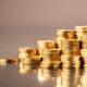 Gold prices are near a record high. Here's why experts say it's worth investing in anyway. 