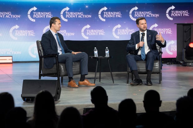 Charlie Kirk moderates a conversation with Vice President JD Vance during Turning Point Action's Chase the Vote campaign event at Generation Church in Mesa, Arizona, on September 4, 2024. 
