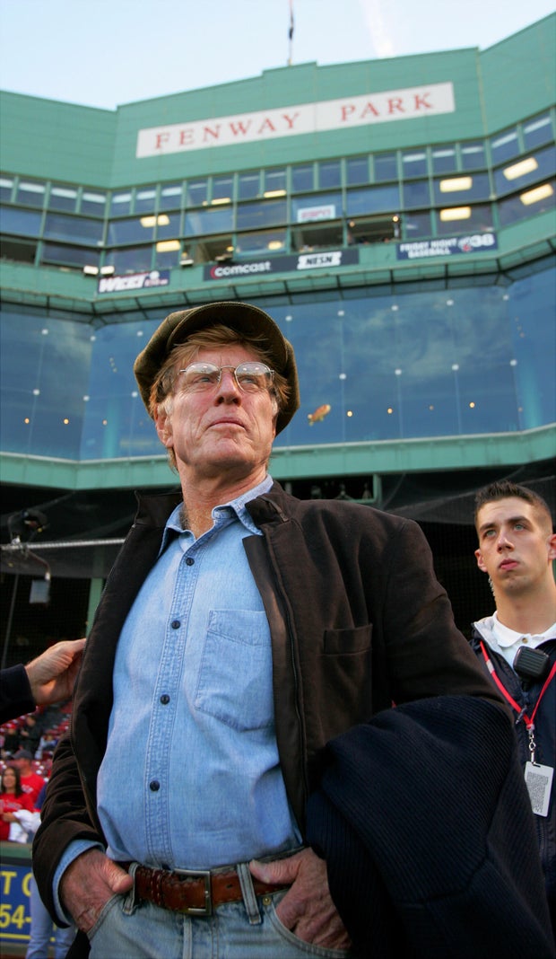 Actor Robert Redford is on the field at Fenway Park before s 