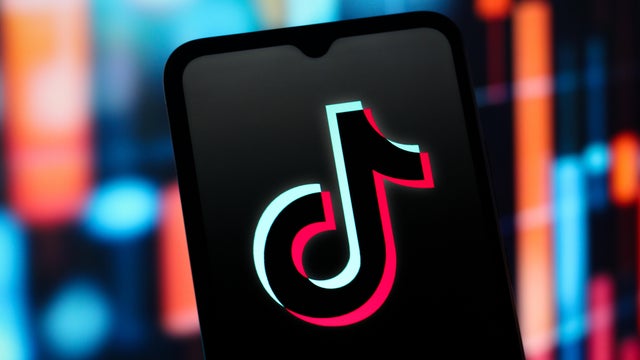 In this photo illustration, the TikTok (Tik Tok) logo is 