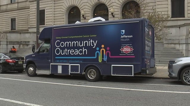 The blue van says Community Outreach, it's a mobile cancer testing van from Jefferson Health 