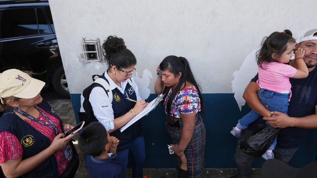 Relatives of unaccompanied minors deported from the United States wait for updates outside La Aurora International Airport in Guatemala City on Aug. 31, 2025. 