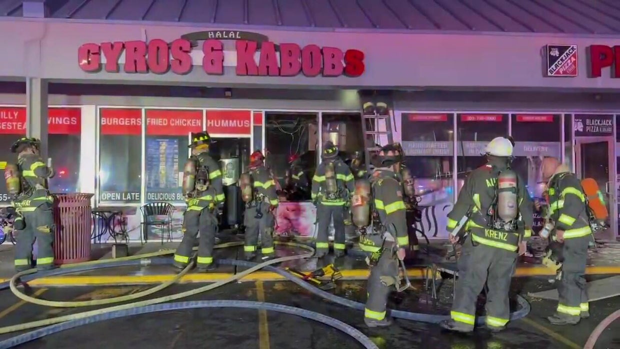 Business damaged in overnight fire at Denver area shopping center - CBS ...