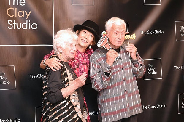 People pose for photos at Mud Ball 2025