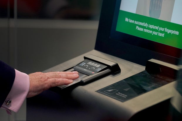 An identity and fingerprint terminal is used during a preview of the newly developed Entry/Exit System zone at the Eurotunnel terminal in Folkestone, England, Sept. 23, 2025. 