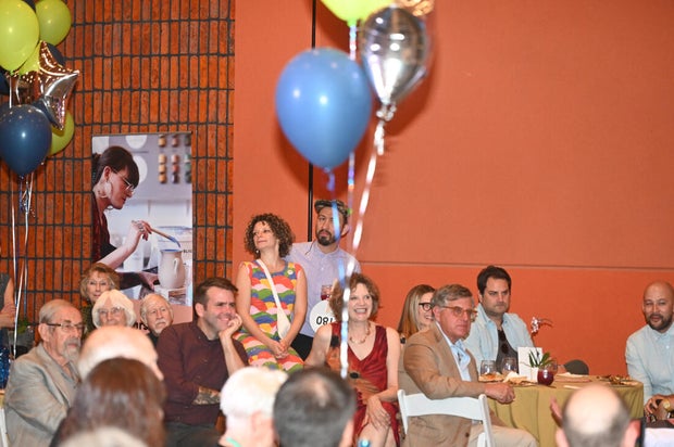 People pose for photos at Mud Ball 2025