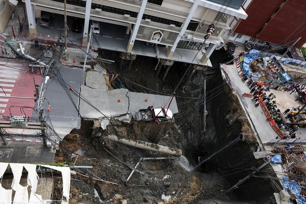 Massive sinkhole near Bangkok hospital halts traffic, cuts utilities 