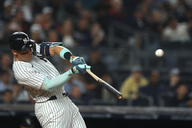 Aaron Judge #99 of the New York Yankees hits a 3-run home run during the second inning against the Chicago White Sox at Yankee Stadium on September 24, 2025 in the Bronx borough of New York City. 