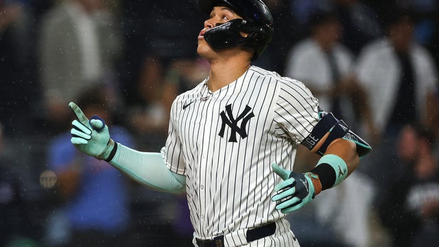 Aaron Judge #99 of the New York Yankees reacts to hitting a solo home run during the eighth inning against the Chicago White Sox at Yankee Stadium on September 24, 2025 in the Bronx borough of New York City. 