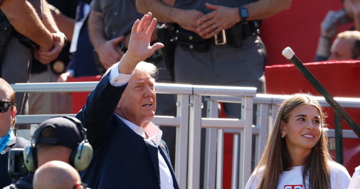 Trump attends Ryder Cup to spice up U.S. staff on first day of matches with Europe