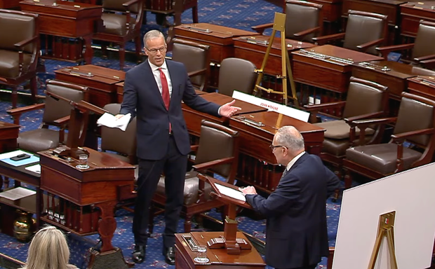 Senate Majority Leader John Thune and Minority Leader Chuck Schumer debate government funding on Senate floor on Tuesday, Sept. 30, 2025. 