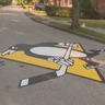 Painting the streets black and gold, Pittsburgh neighborhood shows sports pride in unique way 