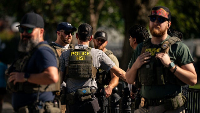 Agents from the Homeland Security Investigations unit, U.S. Park Police officers, and U.S. Secret Service Uniformed Division officers conduct a traffic stop near the White House in Washington, D.C., on Aug. 26, 2025. 