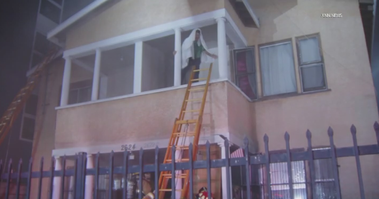 6 people rescued after fire engulfed apartment building in South Los ...
