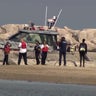 Woman rescued from Lake Michigan at Rainbow Beach; man still missing in water 