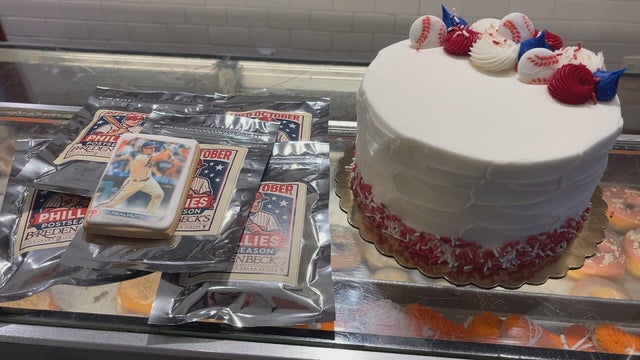 Baseball card cookies and a red and blue cake 