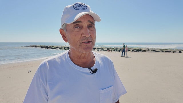 Frank LaFerrara speaks to the reporter on the beach in Ocean City, New Jersey 