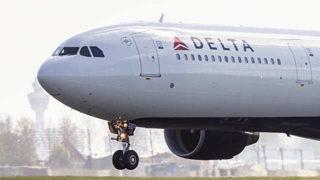 A Delta Air Lines Airbus A330-300 wide-body passenger airplane takes off from Amsterdam's Schiphol Airport for Minneapolis, April 10, 2025. 