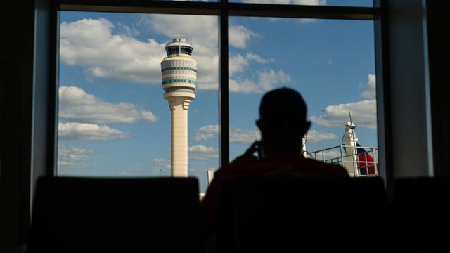 Travelers At HartsfieldJackson Atlanta International Airport As Congress Averts FAA Lapse With Stopgap Passage 