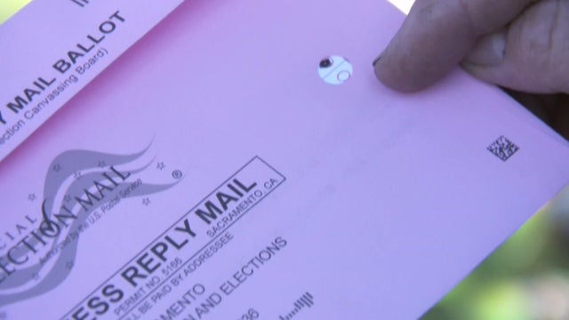 for-web-mail-in-ballot-hole.jpg 