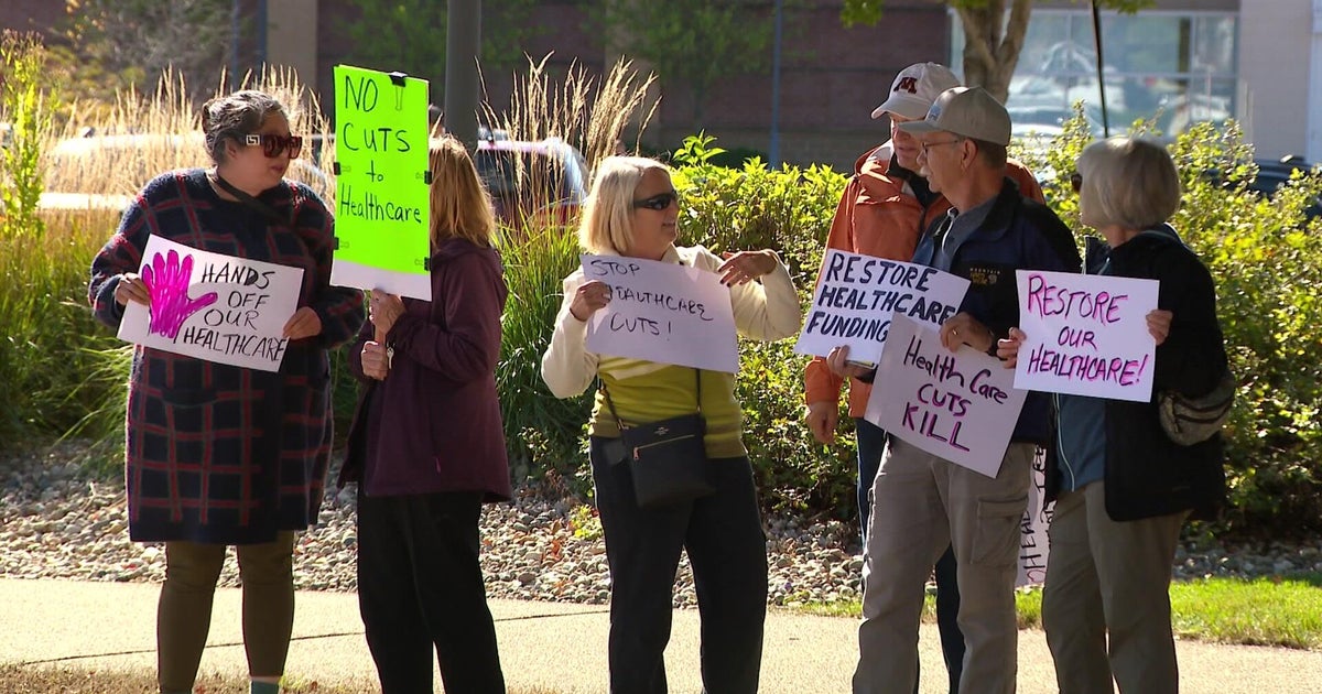 Constituents gather at Rep. Tom Emmer’s office, protest health cuts