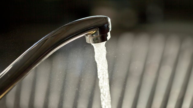 Running water from a tap 