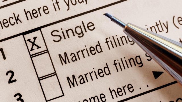 A closeup of a U.S. Tax Form with filing status -marked as "single." 