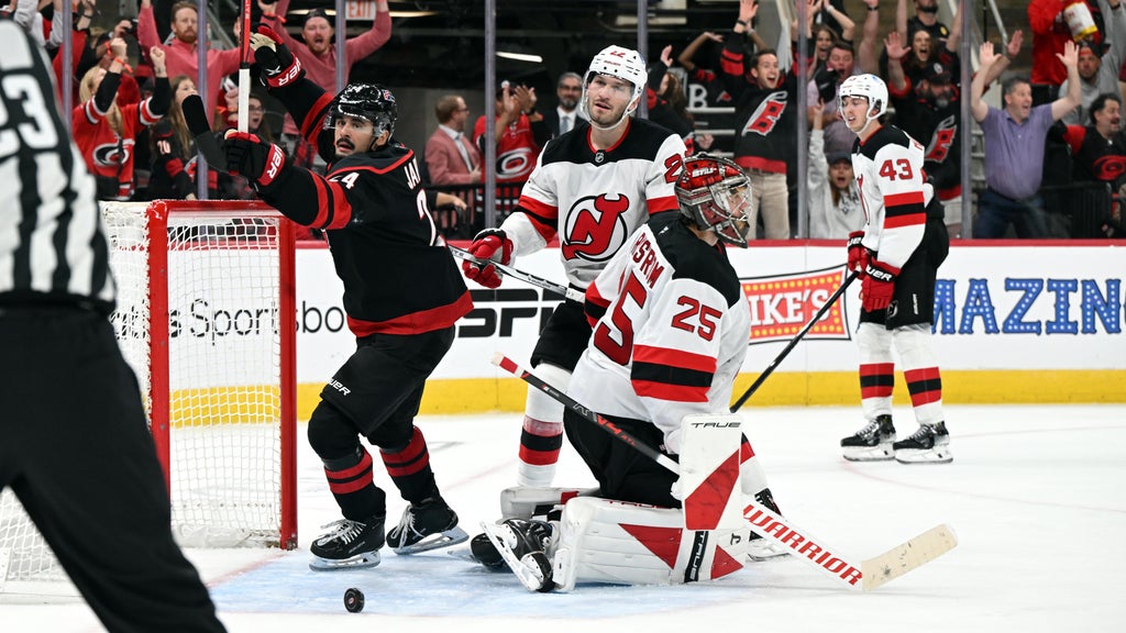Jarvis, new arrival Miller help Hurricanes beat Devils in season opener