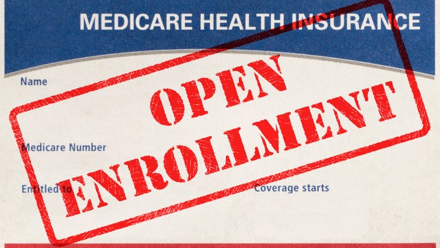 Open Enrollment Medicare Card With Rubber Stamp 