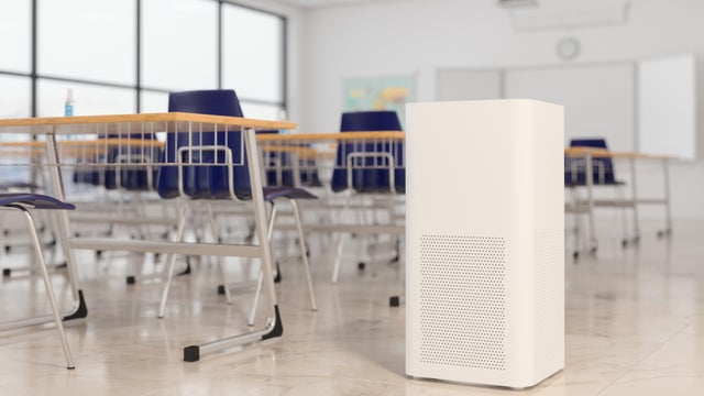 Close-up View Of Air Purifier In Empty Classroom For Fresh Air, Healthy Life And Removing Dust 