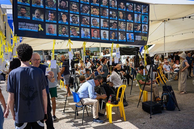After Hostages' Return, Israelis Focus On Fate Of Deceased And Future Of Peace Process