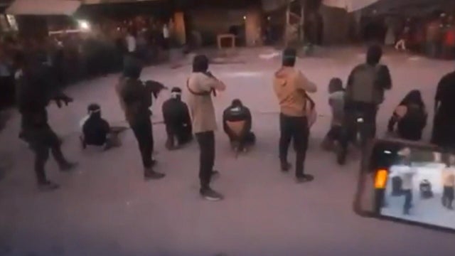 cbsn-fusion-hamas-fighters-execute-palestinians-they-accuse-of-collaborating-with-israel-thumbnail.jpg 