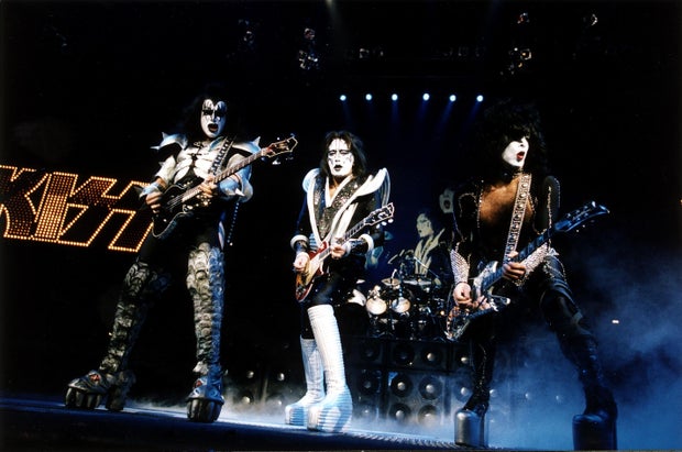 Kiss members in concert in 1999 
