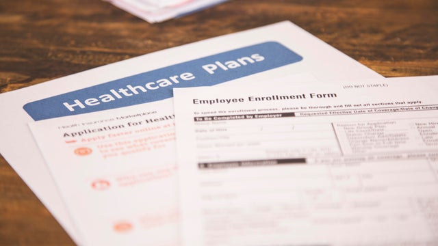 Open enrollment healthcare benefit forms. 