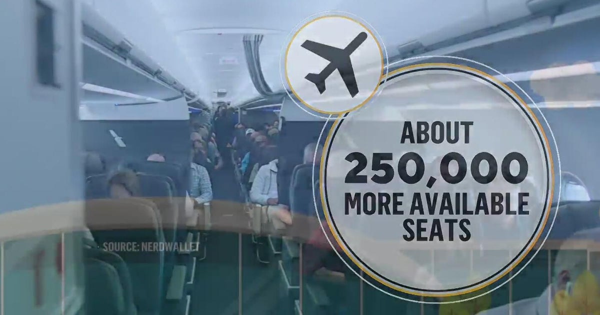 Holiday travel surges despite economic strain