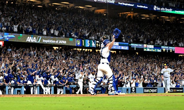 Shohei Ohtani hits three home runs and strikes out 10 batters as the Los Angeles Dodgers defeated the Milwaukee Brewers 5-1 to win game 4 and the NLCS.