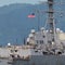Trump administration alludes to Venezuelan land strikes as it docks warship in Trinidad and Tobago