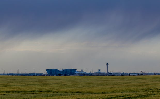 Denver International Airport against the stormy sky 