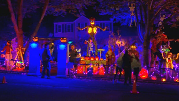 A massive Halloween display at a Massachusetts home benefits the town's food pantry