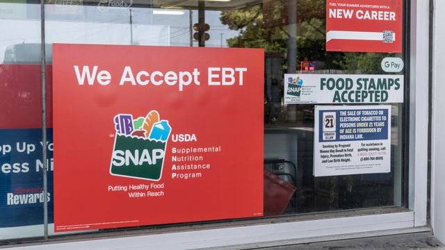 SNAP and EBT Accepted here sign. SNAP and Food Stamps provide benefits to help the budgets of disadvantaged families.
