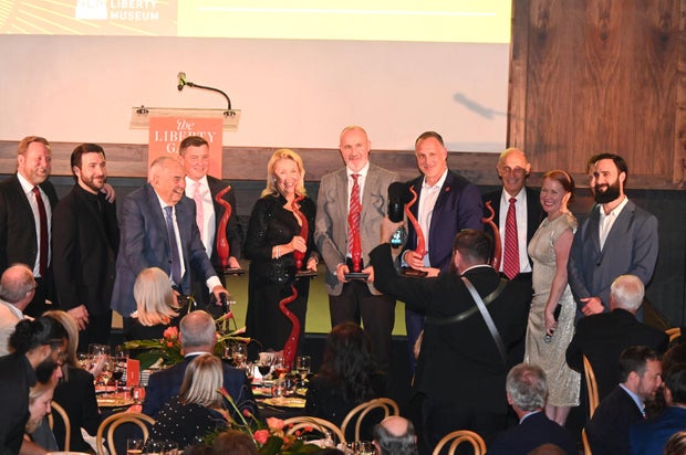 People pose for photos at the 2026 gala for the National Liberty Museum