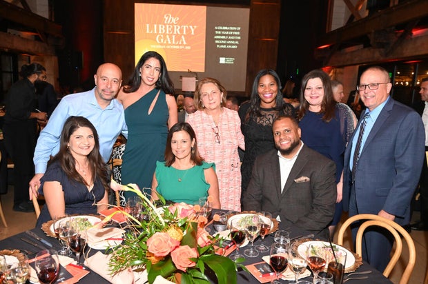 People pose for photos at the 2026 gala for the National Liberty Museum