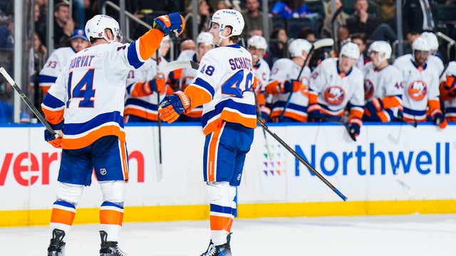 Bo Horvat #14 of the New York Islanders celebrates with teammates after scoring a goal in the second period against the New York Rangers at Madison Square Garden on November 8, 2025 in New York City. 