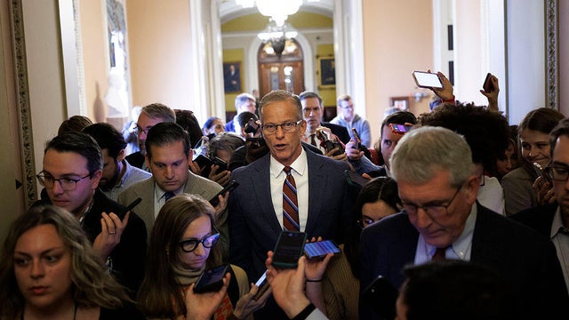 Senate Majority Leader John Thune of South Dakota speaks to reporters while walking to his office at the U.S. Capitol in Washington, D.C., on Nov. 10, 2025, after the Senate reached a deal to fund the government. 