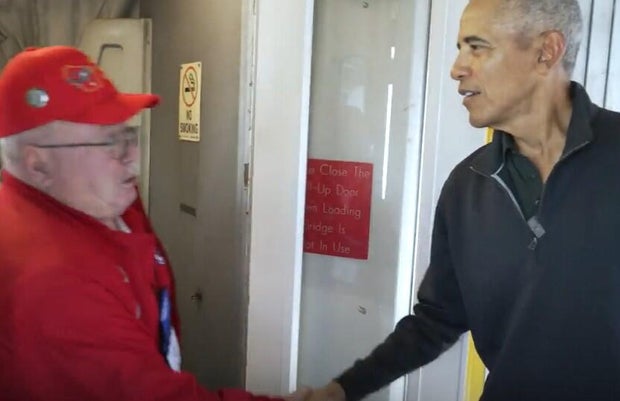 obama-greets-veteran-aftger-surprising-planeload-of-vets-who-arrived-in-dc-for-veterands-day-2025.jpg 