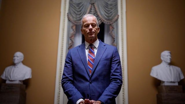 Senate Majority Leader John Thune pauses while speaking to reporters outside the Senate Chamber after the Senate passed legislation to reopen the government on November 10, 2025 on Capitol Hill in Washington, DC. 