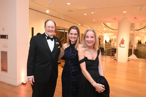 People pose for a photo at the 27th Annual Bacchanal Wine Gala and Auction 