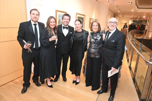 People pose for a photo at the 27th Annual Bacchanal Wine Gala and Auction 