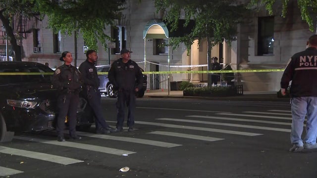 Police officers and crime scene tape on the Upper East Side 