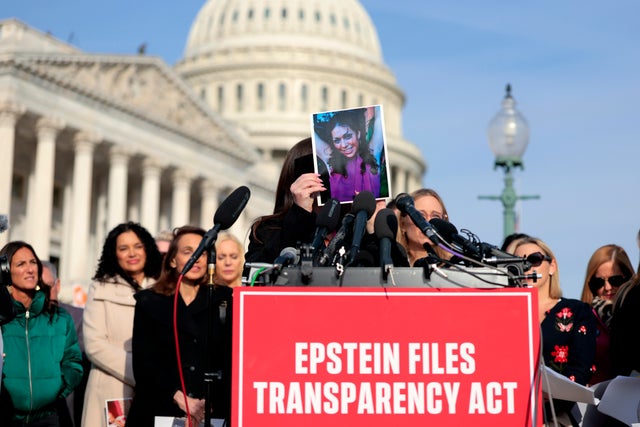 Epstein abuse survivor Haley Robson holds up a photo of her younger self during a news conference on the Epstein Files Transparency Act outside the U.S. Capitol on Nov. 18, 2025 in Washington, DC. Epstein abuse survivor Haley Robson holds up a photo of he 